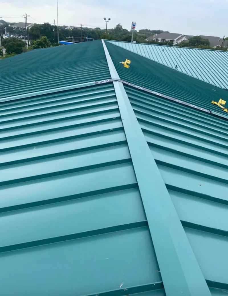 Green commercial metal roof ridge and valley for Metal Roof Repair in Carlisle
